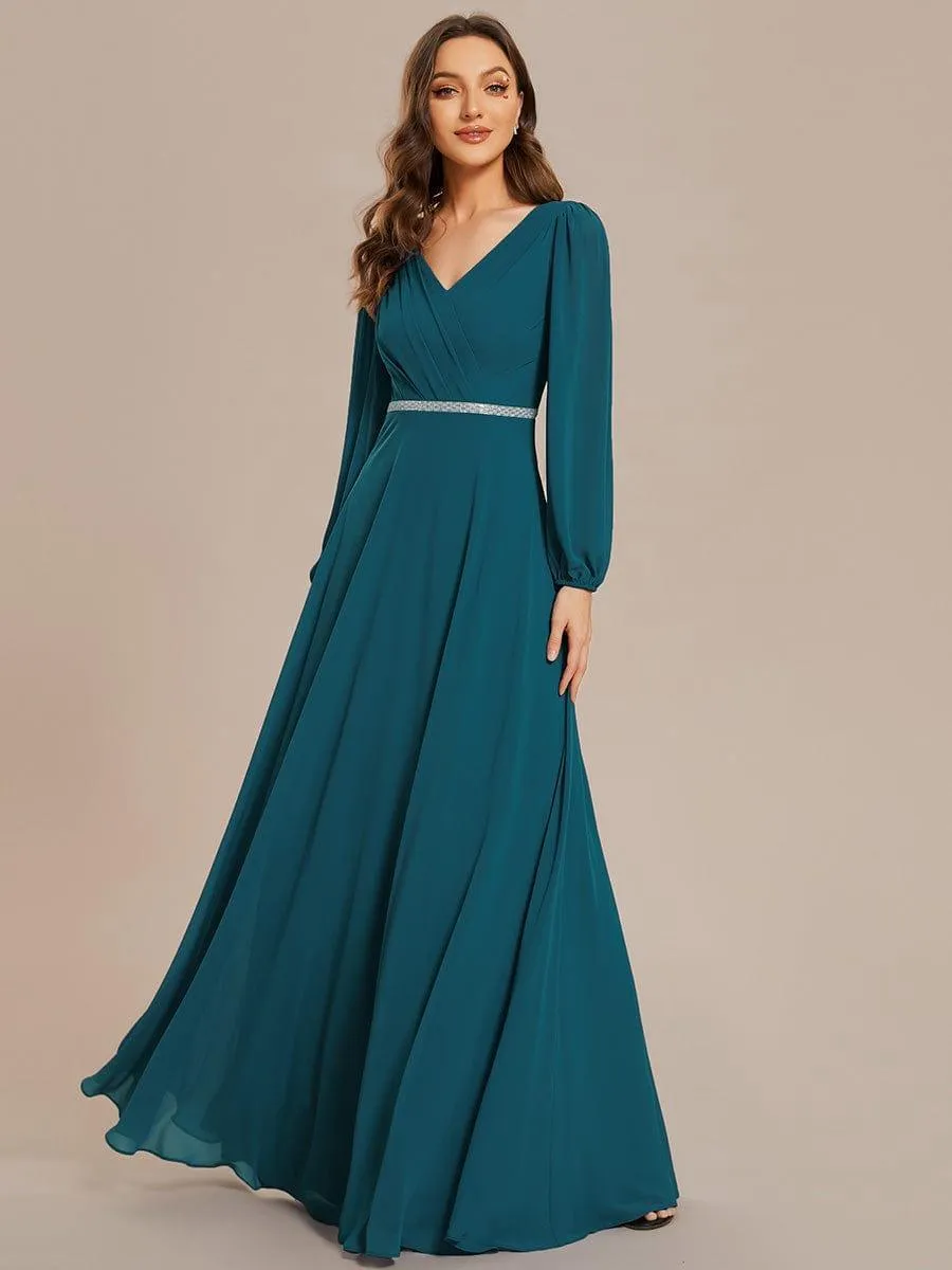 Robe de soirée plissée en mousseline de soie double col en V manches longues ceinture brillante