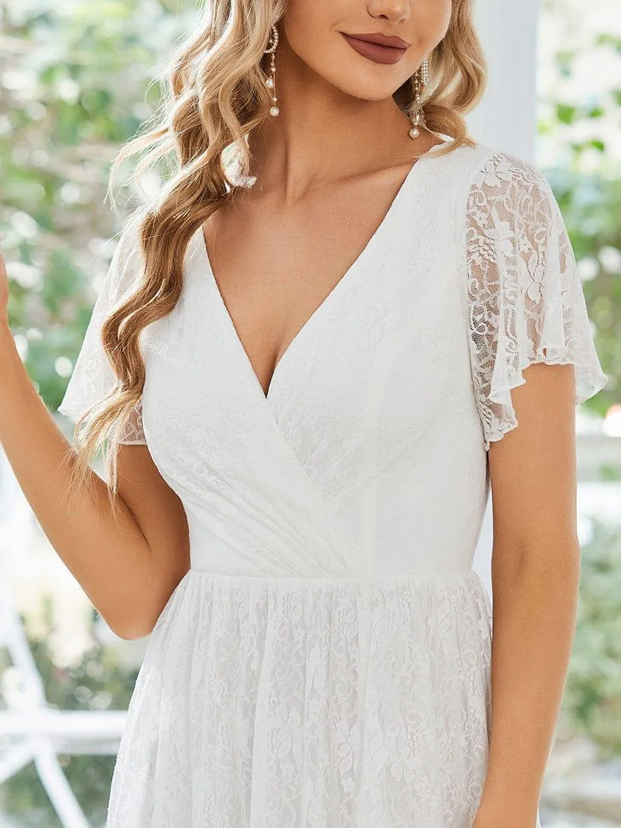 Robe d'invité en dentelle plissée à manches courtes et col V