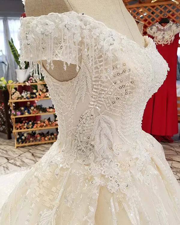 Unique Lace Wedding Dresses Ball Gown Beaded 2018 Shinny Bridal Wedding Gowns Cap Sleeve